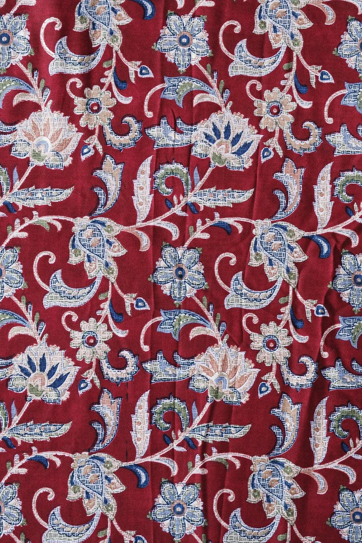 Multi Color Floral Pattern With Foil Print On Maroon Rayon Fabric