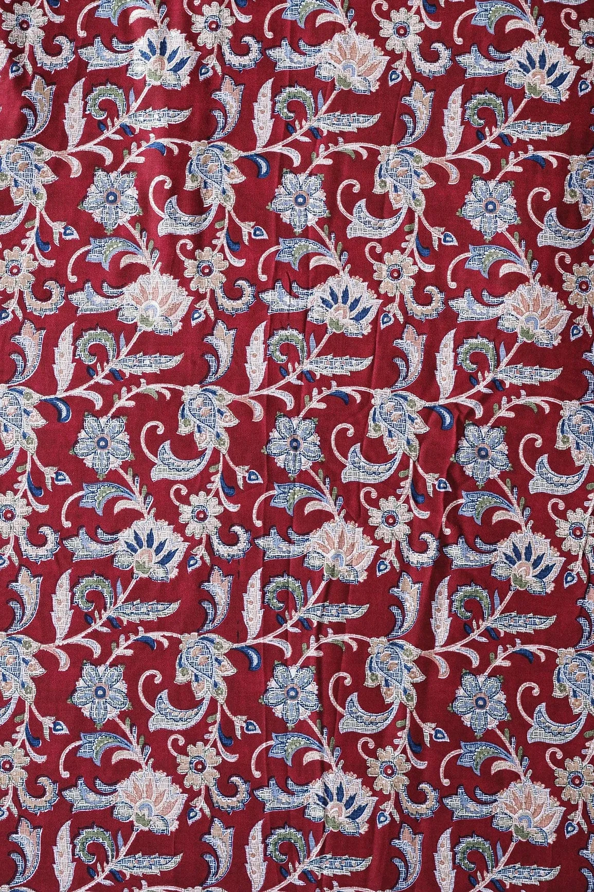 Multi Color Floral Pattern With Foil Print On Maroon Rayon Fabric